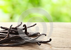 Close up Vanilla beansÂ on brown background